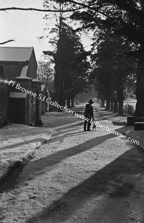 SNOW SCENE ON ROAD OUTSIDE FARM